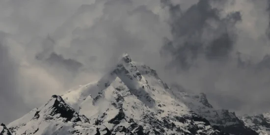 Mt Deo tibba peak covered by clouds