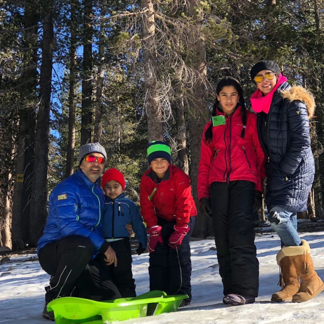 designer holidays by YoloO Life pic of family on snow slopes