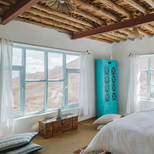 bedroom window with views of spiti valley