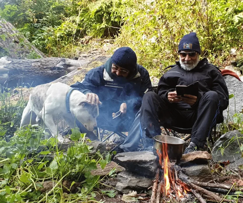 senior adventures with YoloO Life Guests arounda bonfire in VanVaas, Soil Villge, Manali